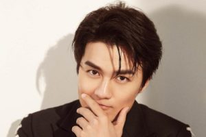 吴克群《越爱越难过吉他谱》C调原版六线谱