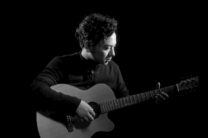 海来阿木《孤独的王吉他谱》C调原版弹唱谱